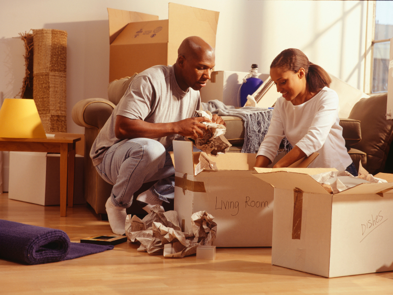 family Unpacking boxes