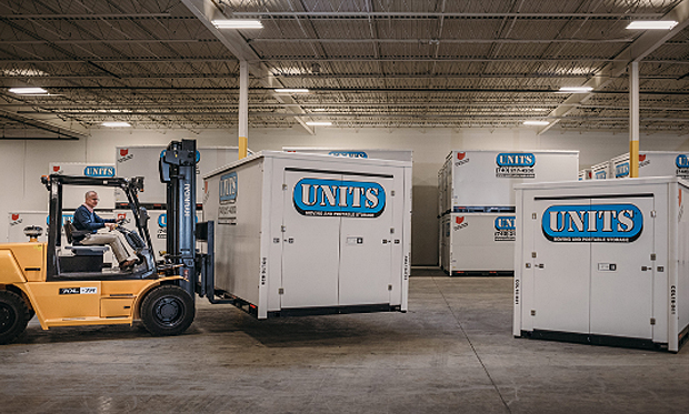 UNITS Moving and Portable Storage containers in a warehouse.