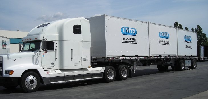 UNITS moving and portable storage container truck with three containers on the back in Orlando FL