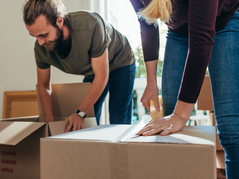 couple Moving Bulky Items