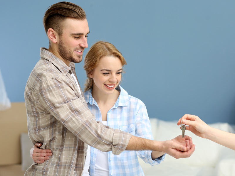 couple who is Renting an Apartment getting their keys