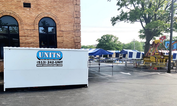 UNITS Moving and Portable Storage of Cincinnati container outside behind a building.