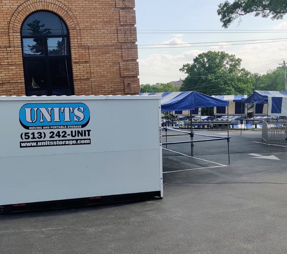 UNITS Moving and Portable Storage of Cincinnati container outside behind a building.