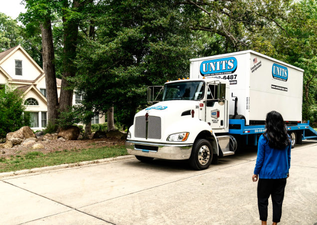 Girl admiring the UNITS moving and portable storage struck in connecticut