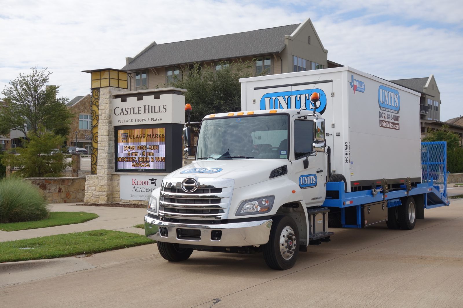 UNITS truck delivering container