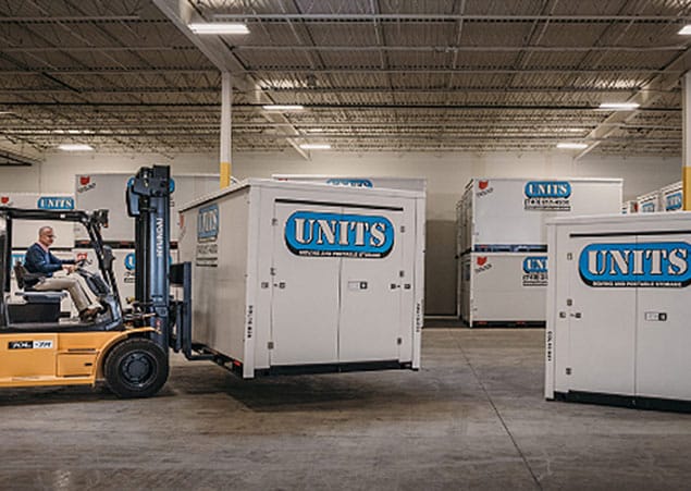 UNITS Moving and Portable Storage containers in a warehouse.