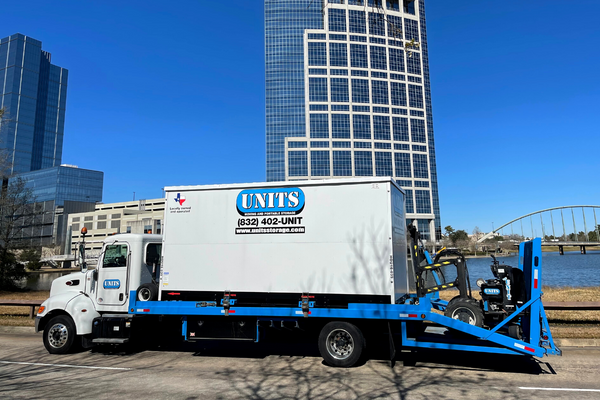 A Units of Houston Gulf Coast truck parked on the street.