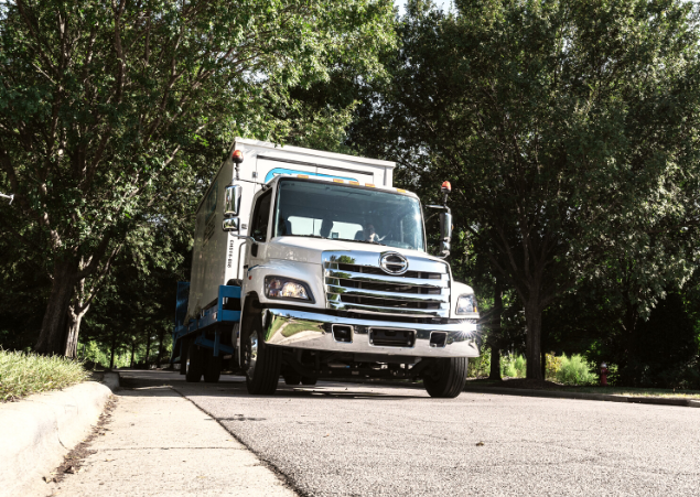 A Units of Houston Gulf Coast truck parked on the street.