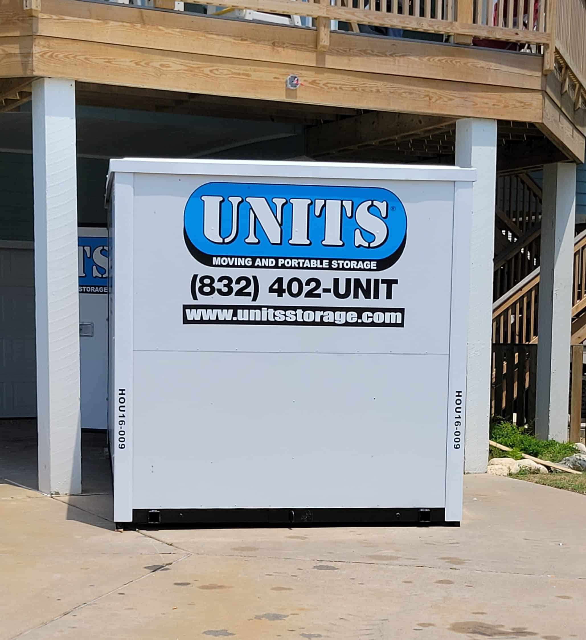 A Units of Houston Gulf Coast container sitting under a porch.