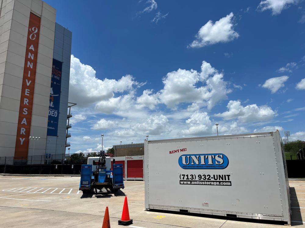 UNITS Moving and Portable Storage containers in a stadium parking lot.