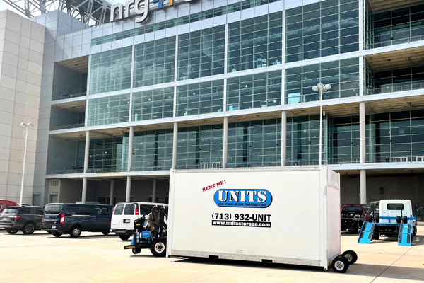 UNITS Moving and Portable Storage container in a stadium parking lot.