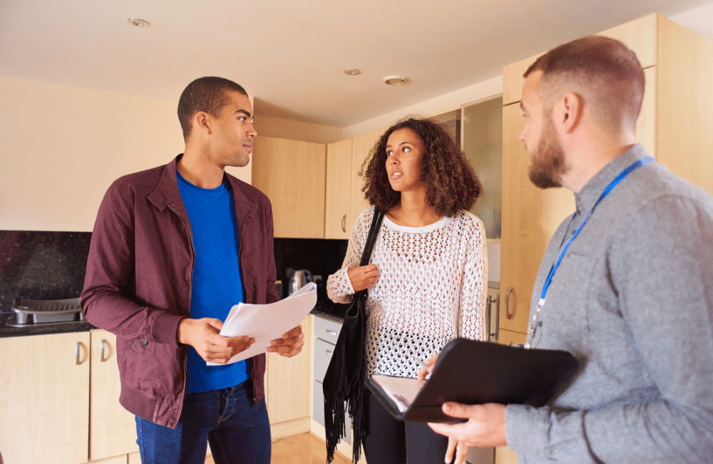 Couple consulting with a realtor.