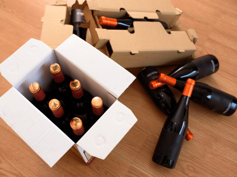 Wine bottles being packed to be moved.