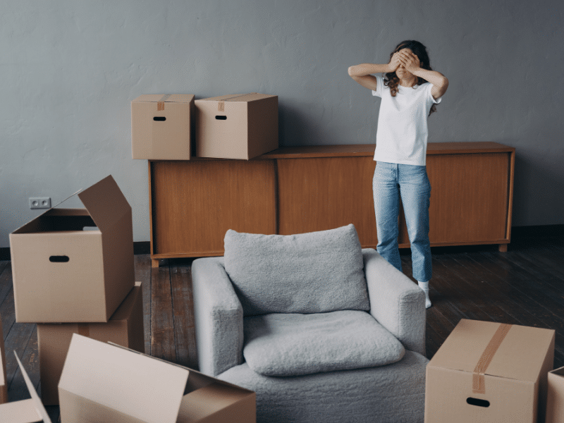 Woman stressed out about moving.