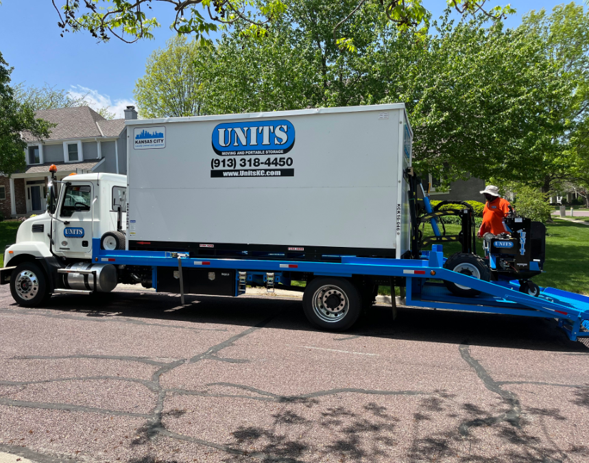 A Units of Kansas City truck parked on the street.