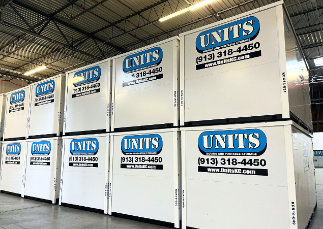 Units of Kansas City containers stacked in a warehouse.