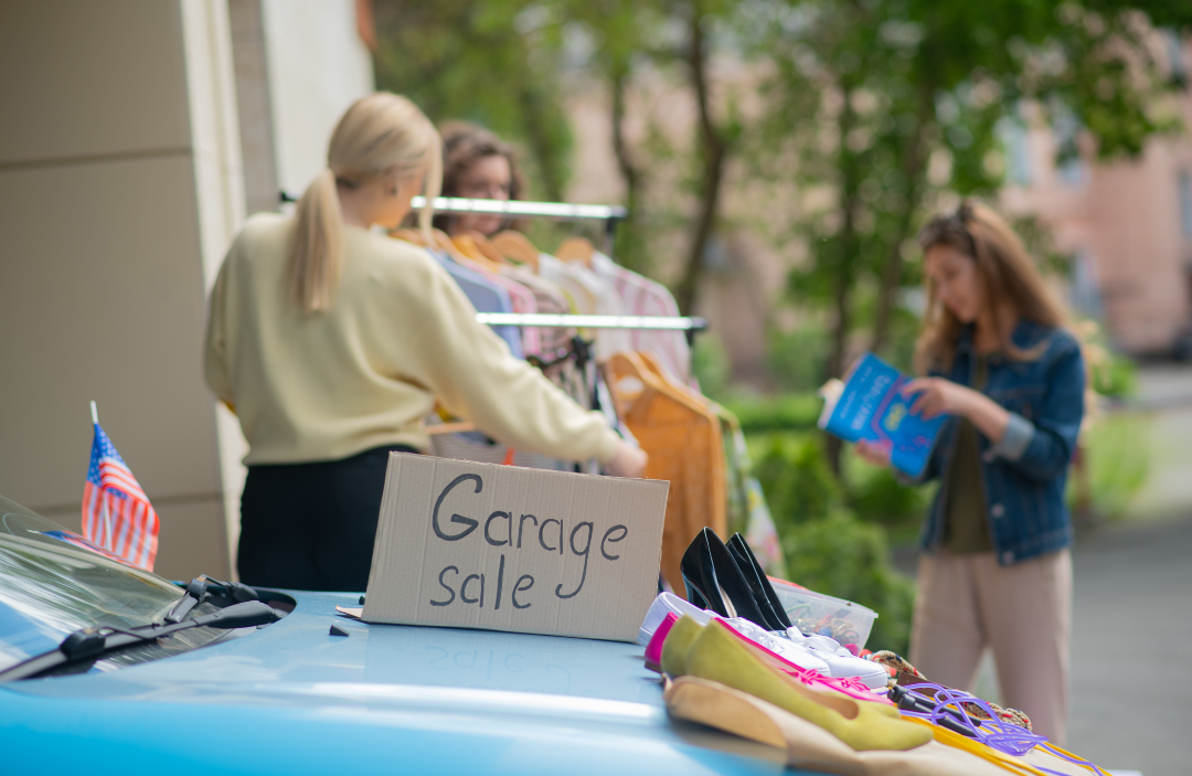 People looking through items at a garage sale.