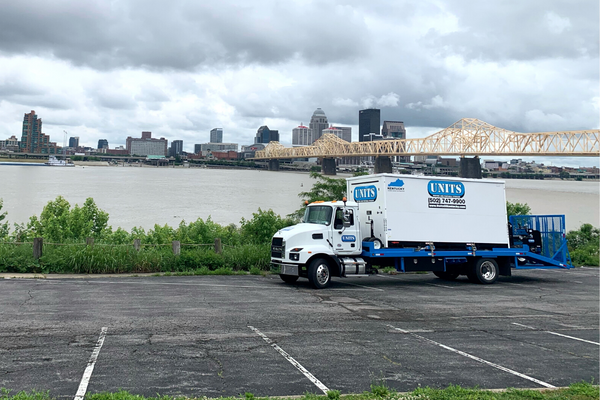 A Units Of Lexington Kentucky truck parked in a parking lot.