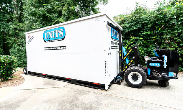 A Units Of Lexington Kentucky sitting in a driveway.