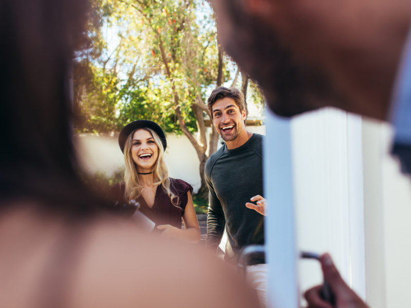 couple arriving with a Summer Housewarming Gift