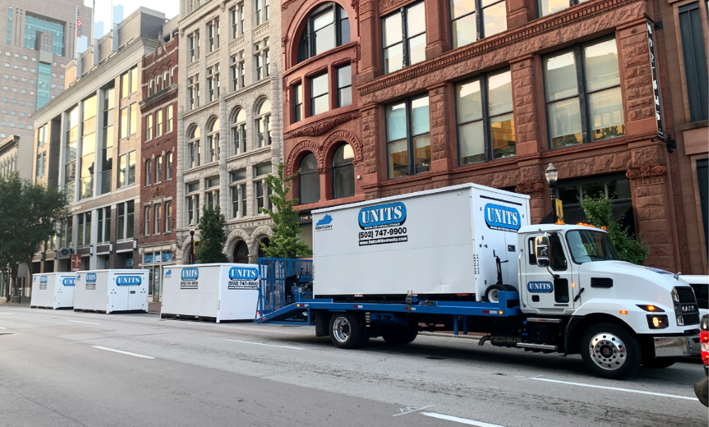 A Units Of Louisville truck parked on the street.