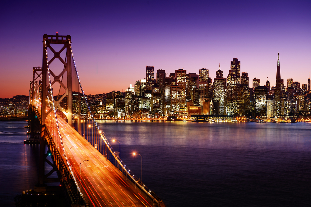 A bridge overlooking a city.