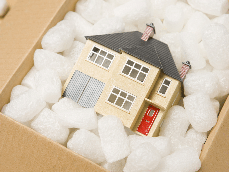 Box with a minature house in Madison Wisconsin