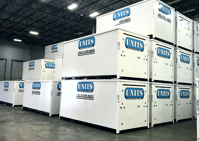 UNITS Moving and Portable Storage of Miami containers stacked in a warehouse.