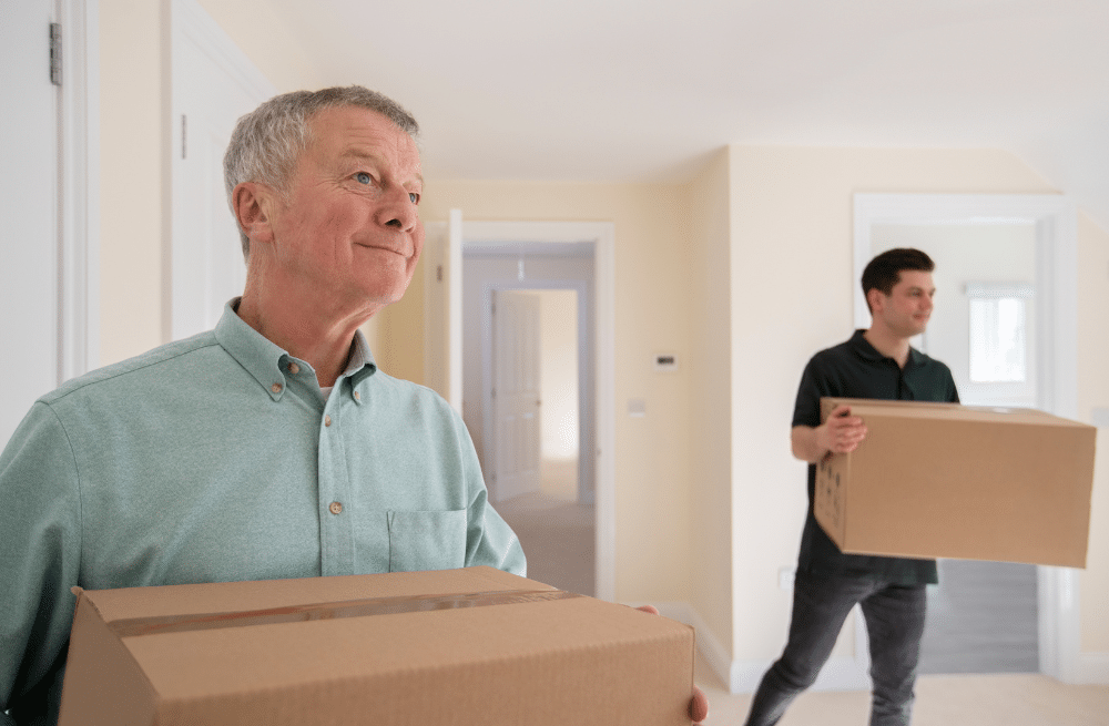 Units of Minneapolis two men moving boxes in a house