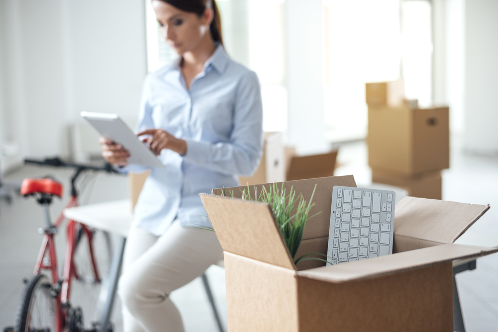 Units of North Denver woman packing office supplies