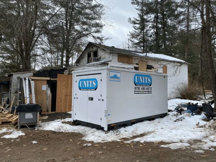 A Units of North Shore container sitting outside.