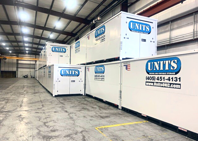 Units of Oklahoma City containers stacked in a warehouse.