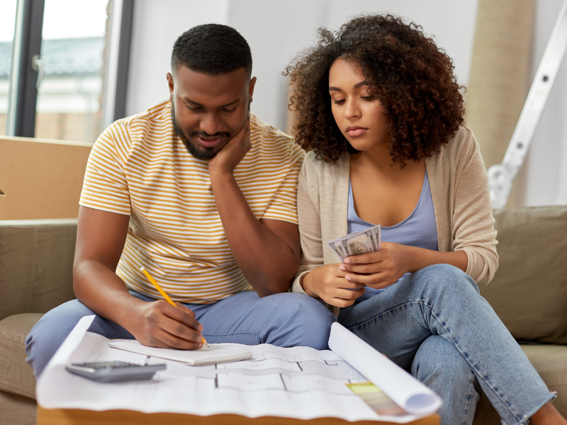 couple looking their moving budget