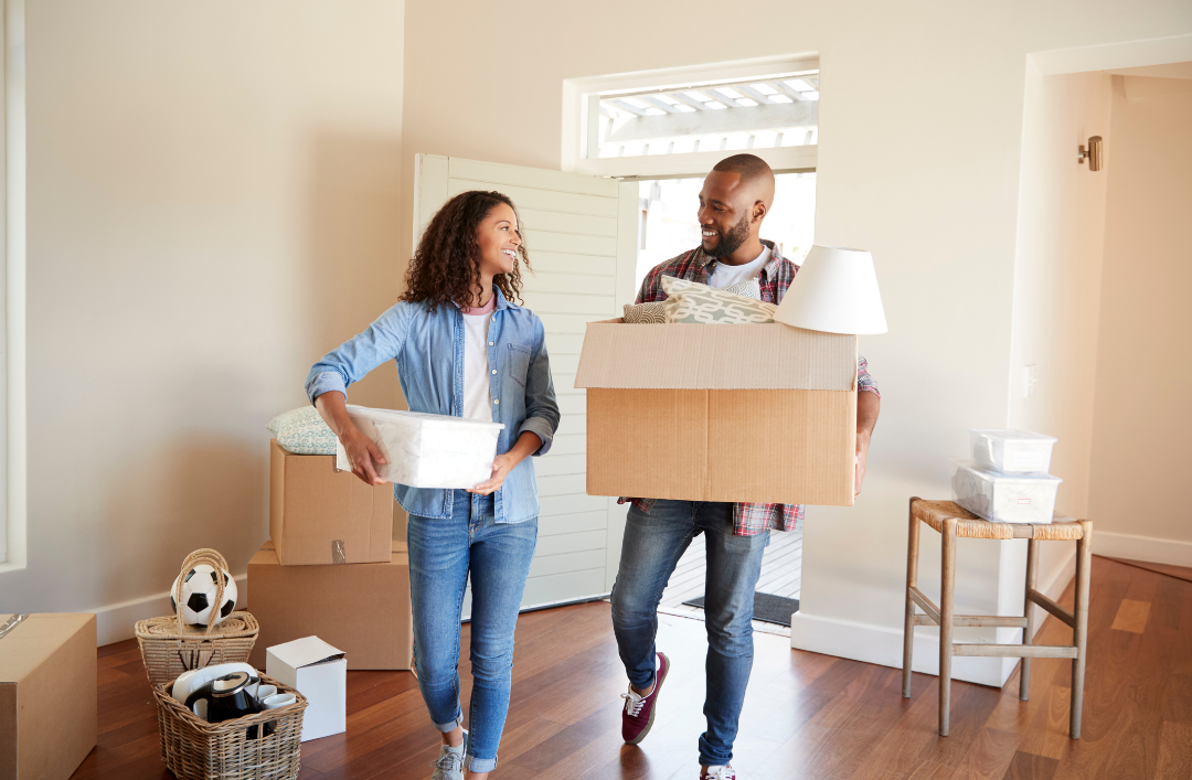 Units of Omaha & Lincoln couple moving items into their new home