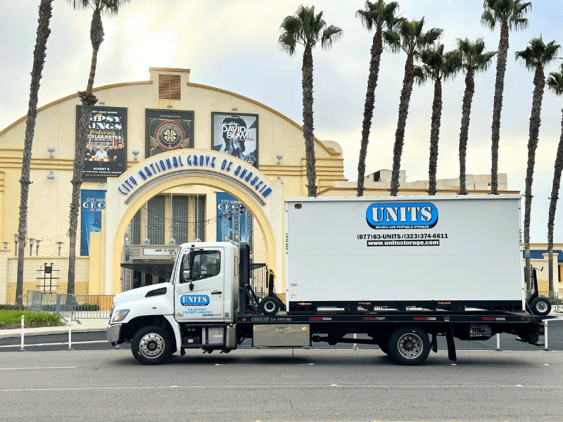 UNITS Moving and Portable Storage Container on the back of a truck in front of the City National Grove of Anaheim.