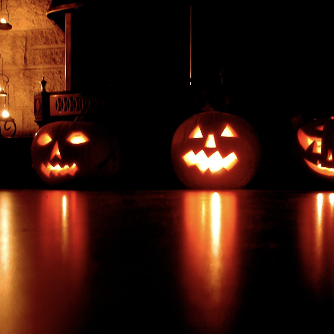 Jack-O-Lanterns at night.