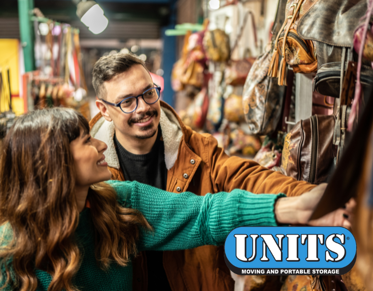 couple in a thrift store with UNITS logo