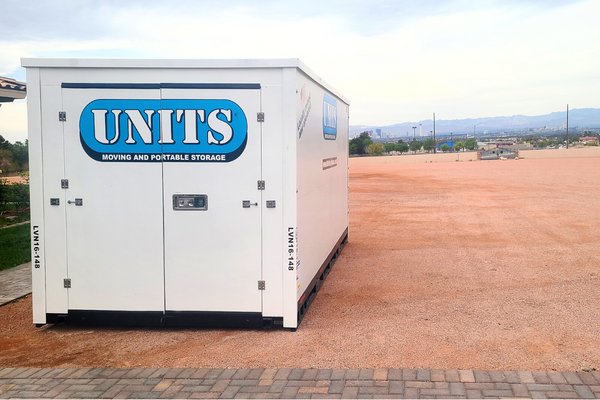 UNITS Moving and Portable Storage of Phoenix container in an empty lot.