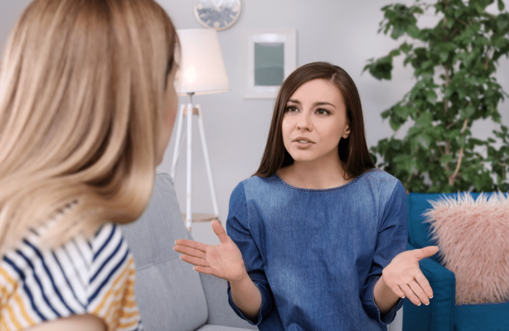 Two young women arguing.