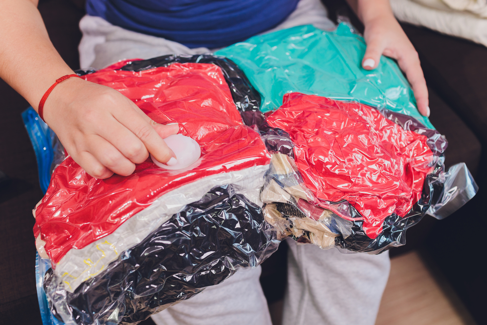 Clothes packed in plastic bags with air suctioned out.