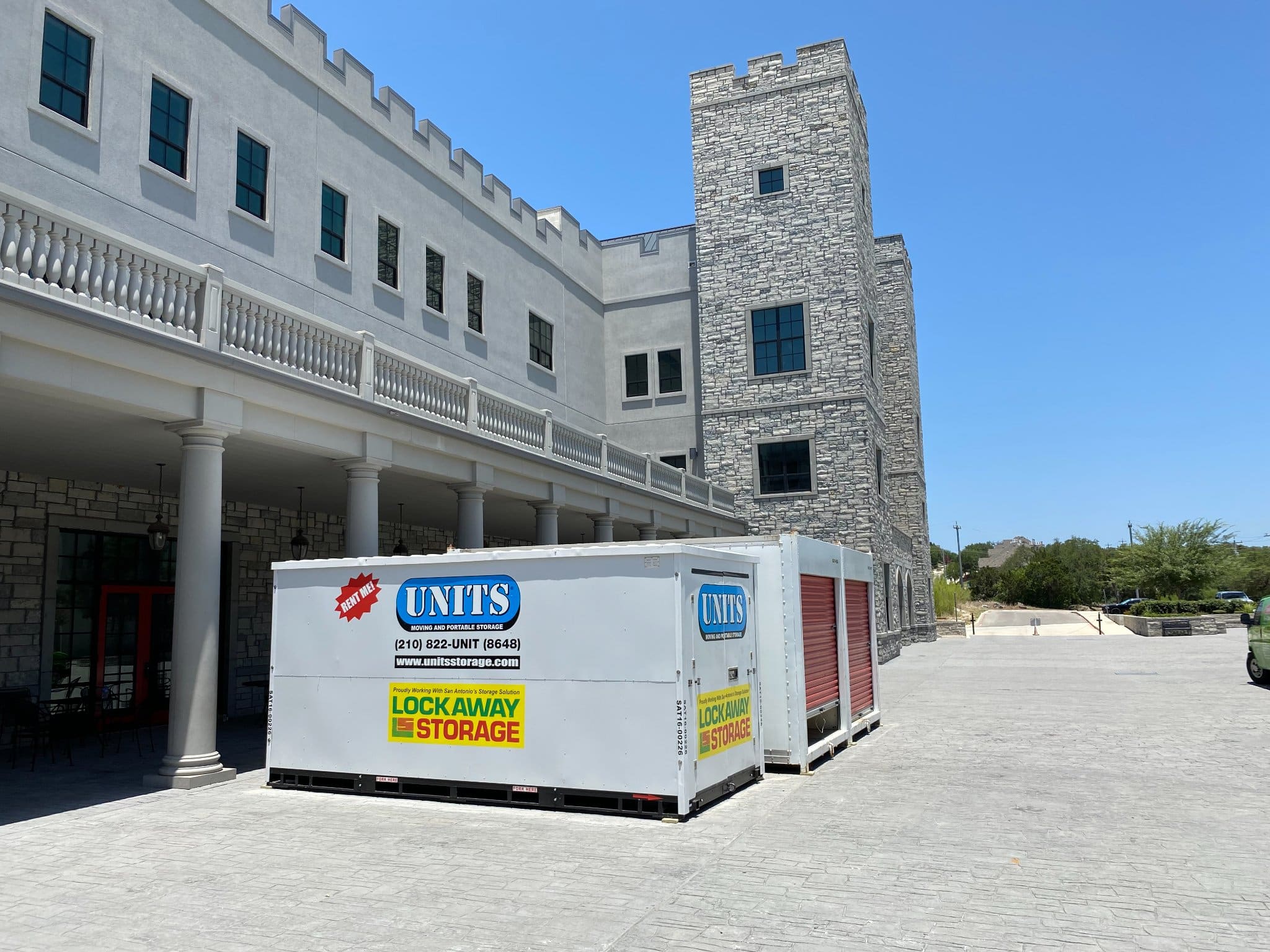 Three UNITS Moving and Portable Storage of San Antonio containers in a lot.