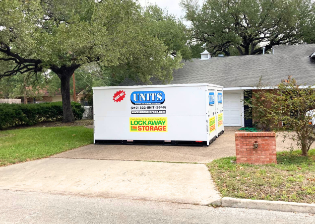 UNITS of San Antonio portable storage container in a driveway!