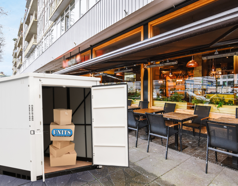 UNITS container in front of a restaurant