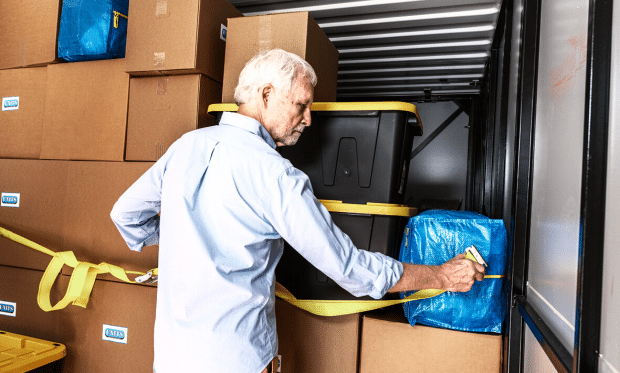 Man securing his belongings in a UNITS Moving and Portable Storage of San Diego container.