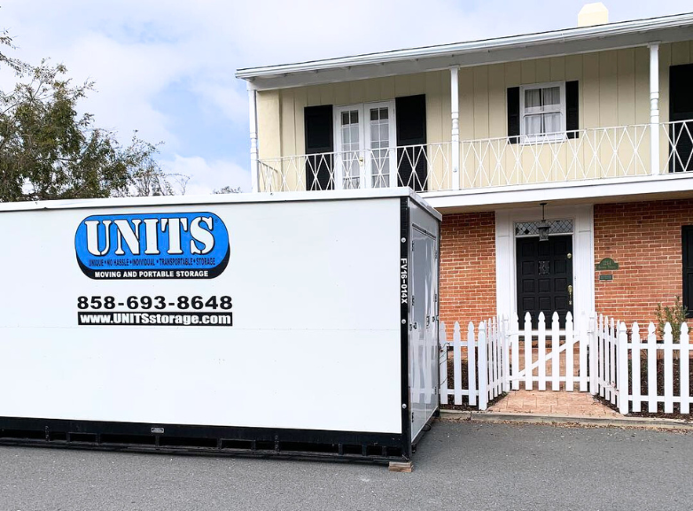 UNITS of San Diego's portable storage container parked outside of a home for storage and moving needs.