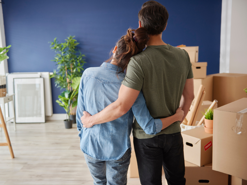 couple standing in their new home