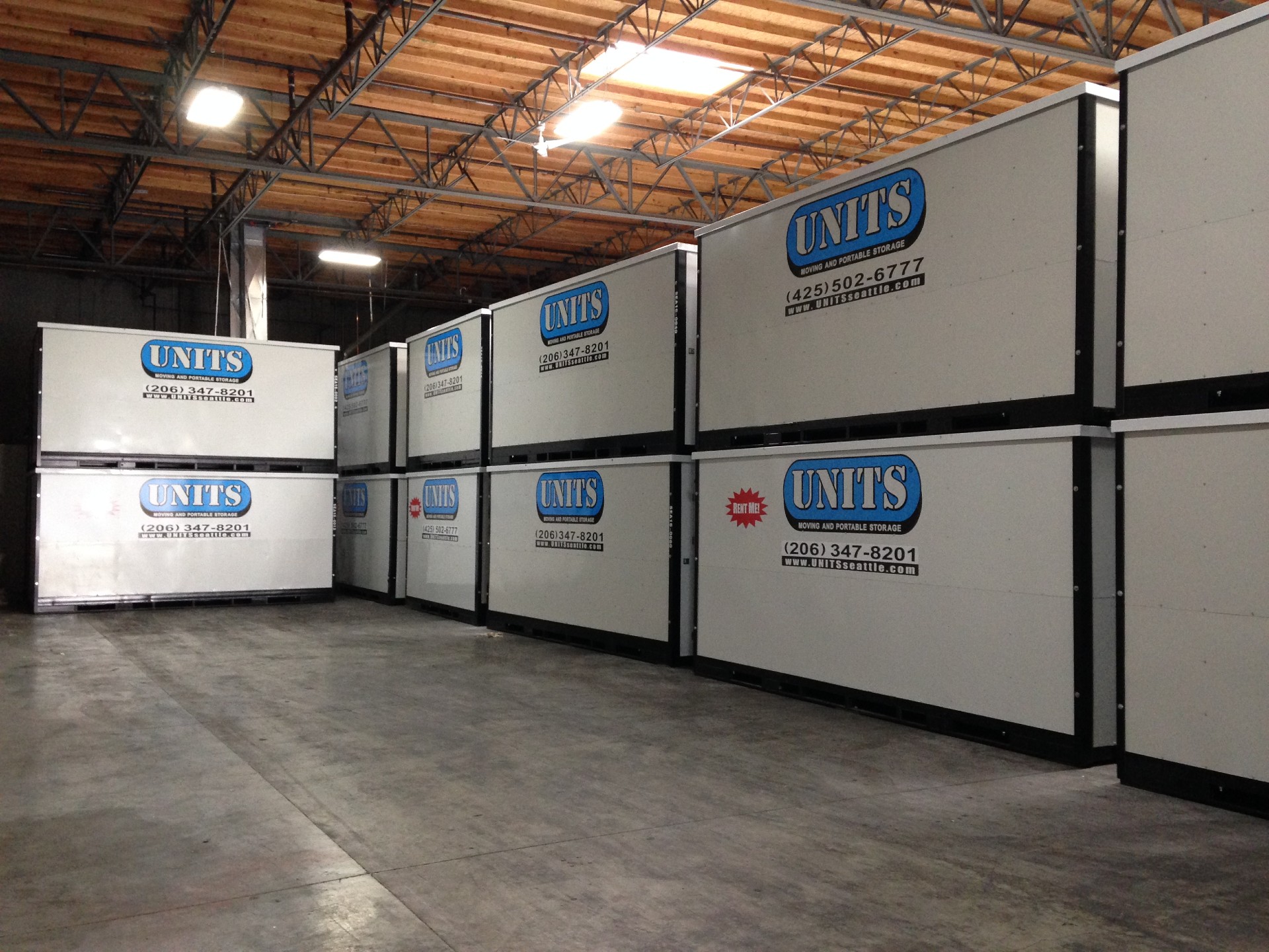 UNITS Moving and Portable Storage containers in a warehouse.