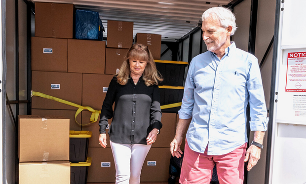 You Pack It. Old couple packing at UNITS of southeast Michigan