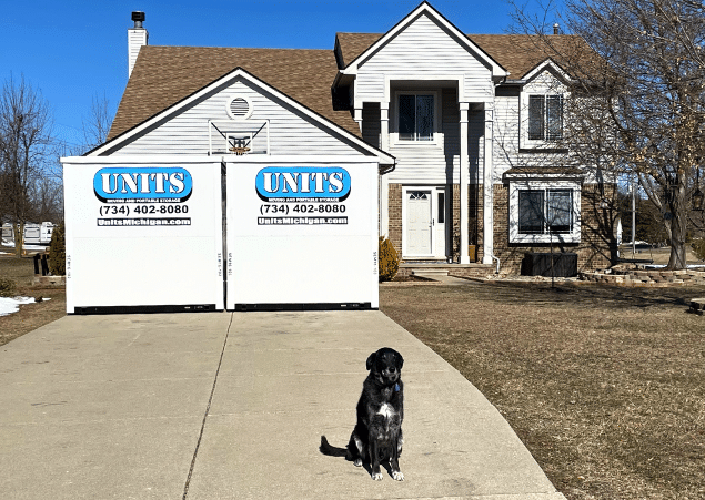 Containers safe and sound in a driveway in southeast michigan