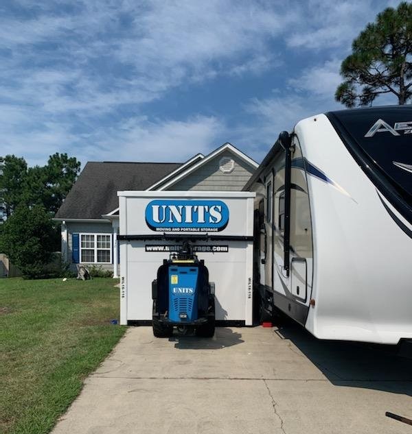 Units of Wilmington container sitting in a driveway.